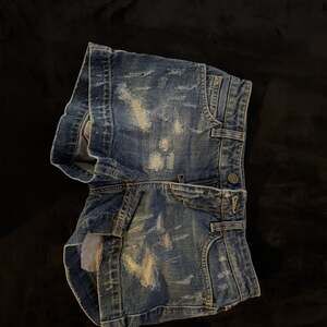 Dolce & Gabbana Distressed Cutoff Denim Shorts